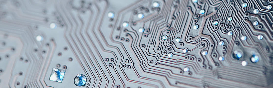Close-up of a computer circuit board representing the technology and infrastructure behind artificial intelligence, a growing focus of policy and regulatory discussions in Washington.