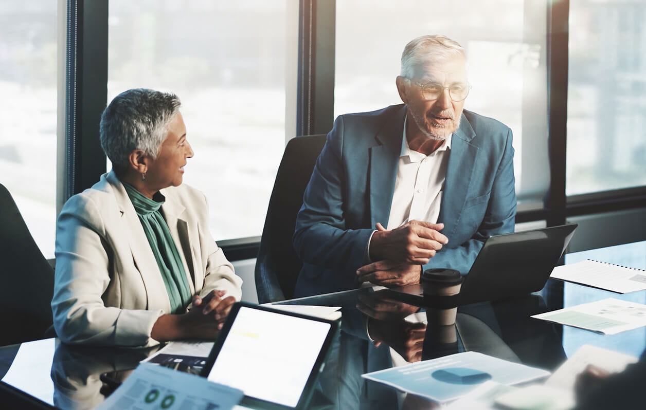 Meeting, planning and people with laptop, boardroom and discussion.